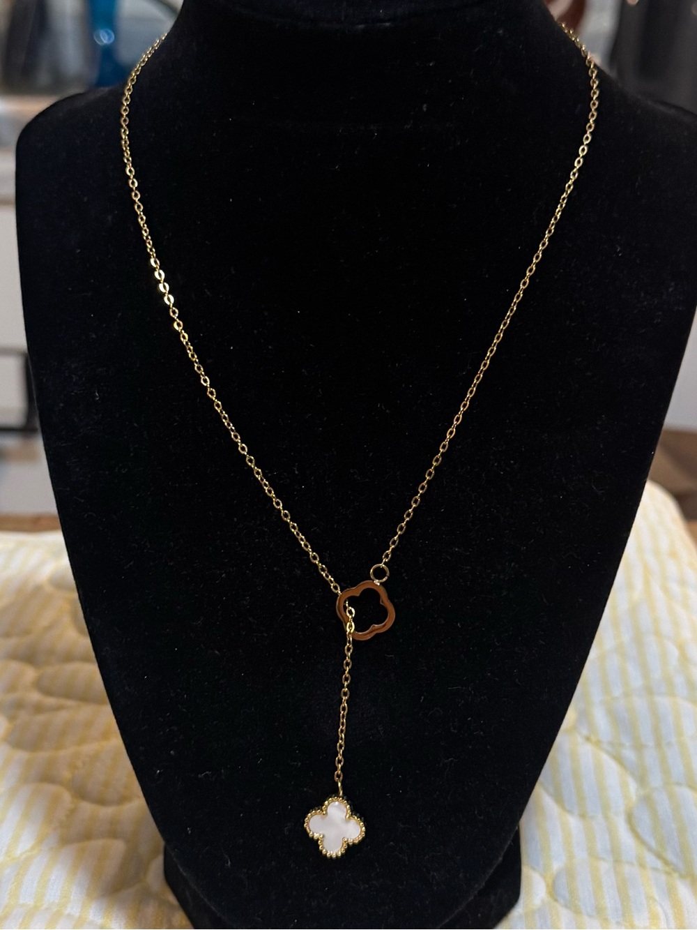 Gold tone Necklace with White Clover Pendant